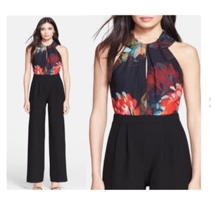 Trina Turk floral/black high neck jumpsuit. Never worn but no tags